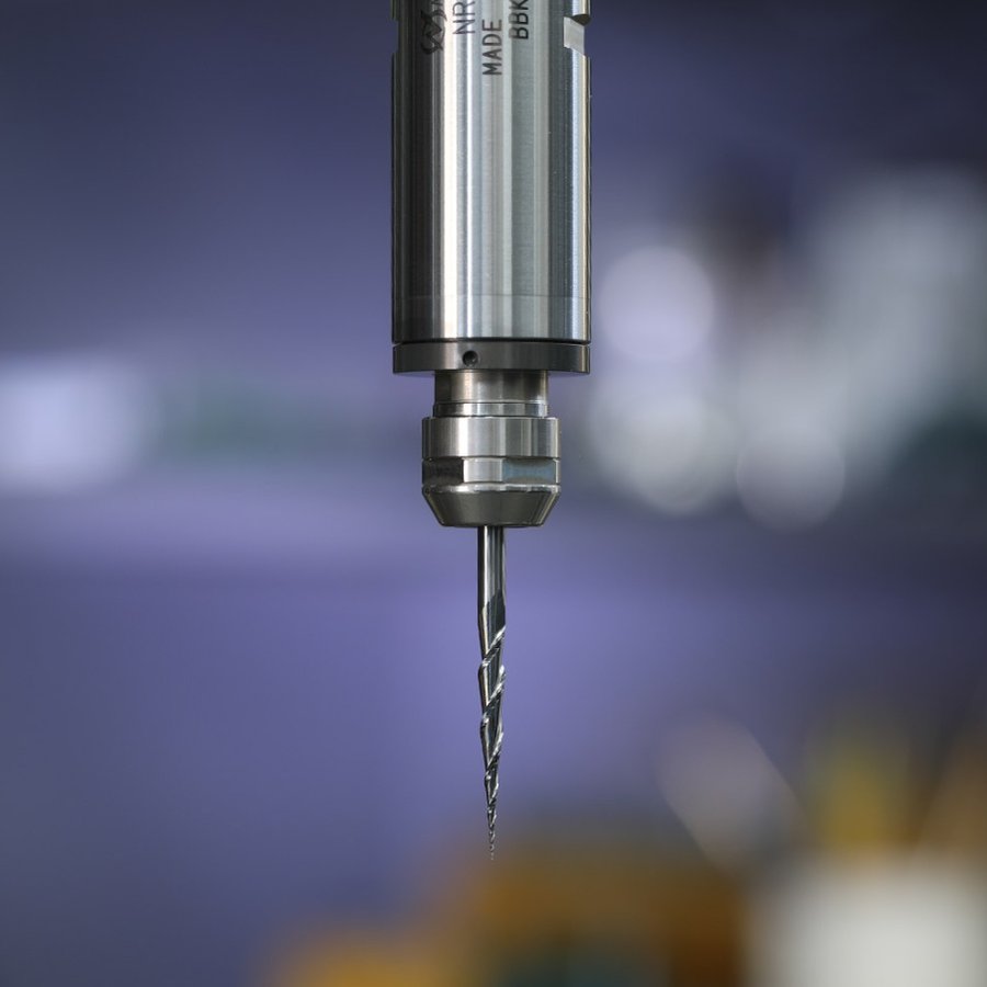 The spindle nose and collet holding a tapered Mira-Bit
